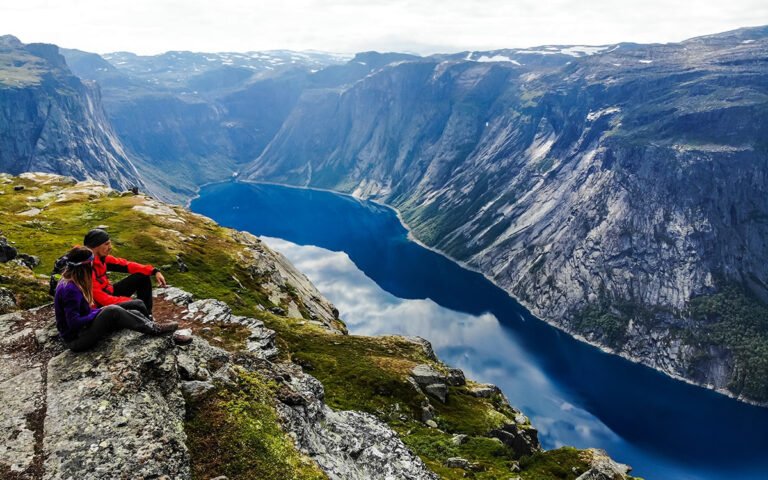 Sitting on rocks, looking at the fjord