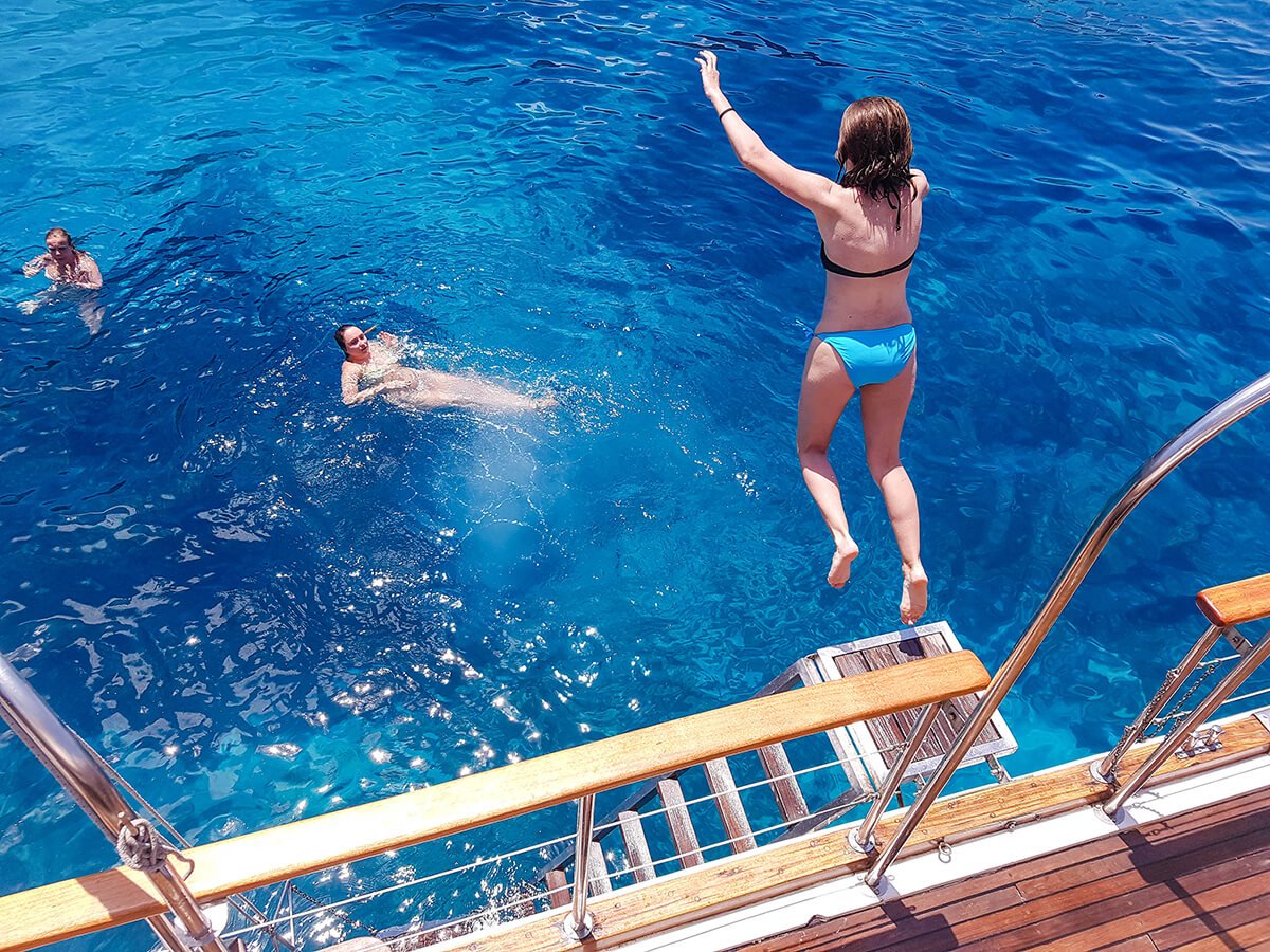 Jumping off the boat at the Crystal lagoon, Malta