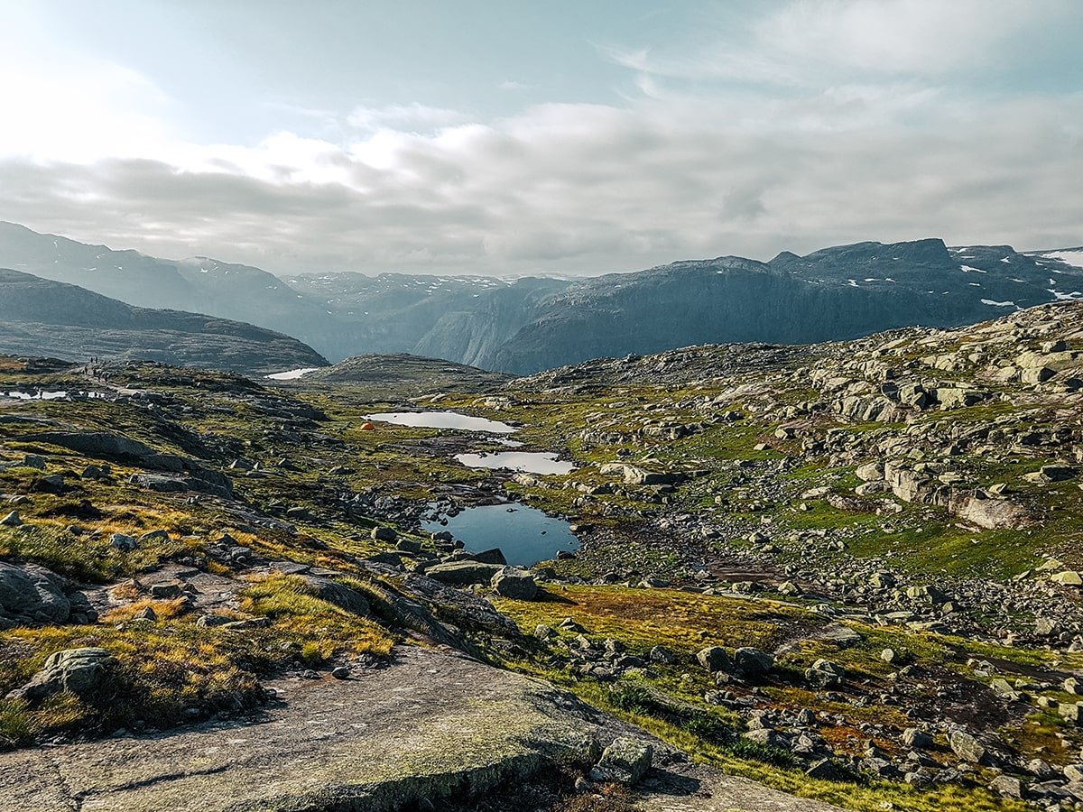 Amazing landscape on the Trolltunga hike with lakes, rocky terrain and mountains