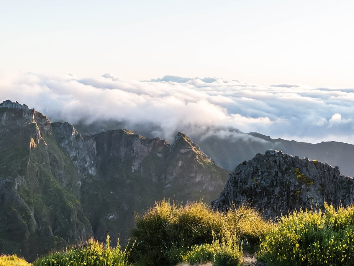 Amazing mountain view with high mountains and clouds
