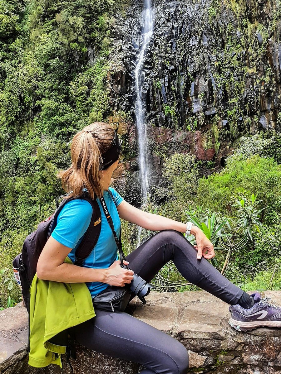 Sitting in front of the waterfall at Levada do Risco