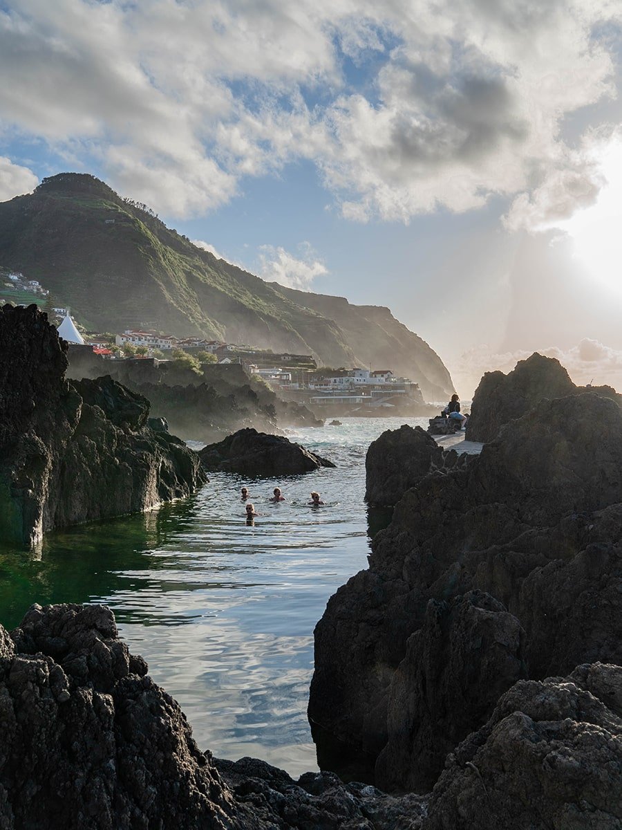 Swimming in the natural pool at sunset in Madeira