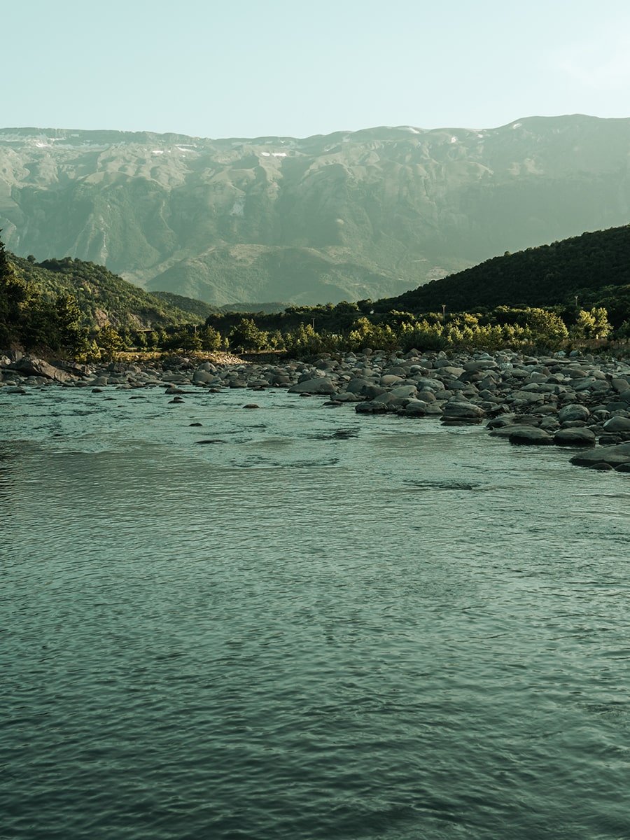 The Langarica River and high mountains in the background