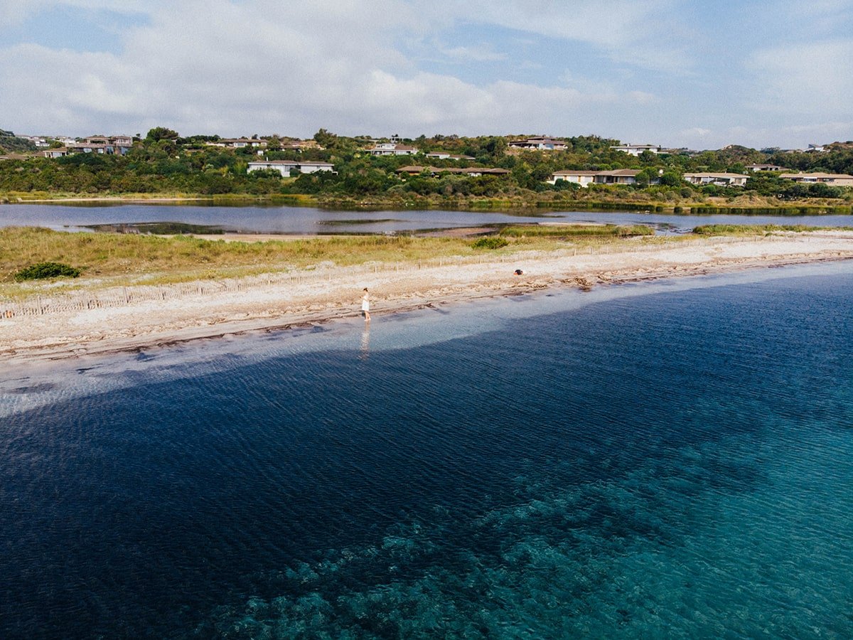 5 Stunning Corsican Beaches - Piantarella: A paradise-like beach with crystal-clear water, white sand, and breathtaking views.