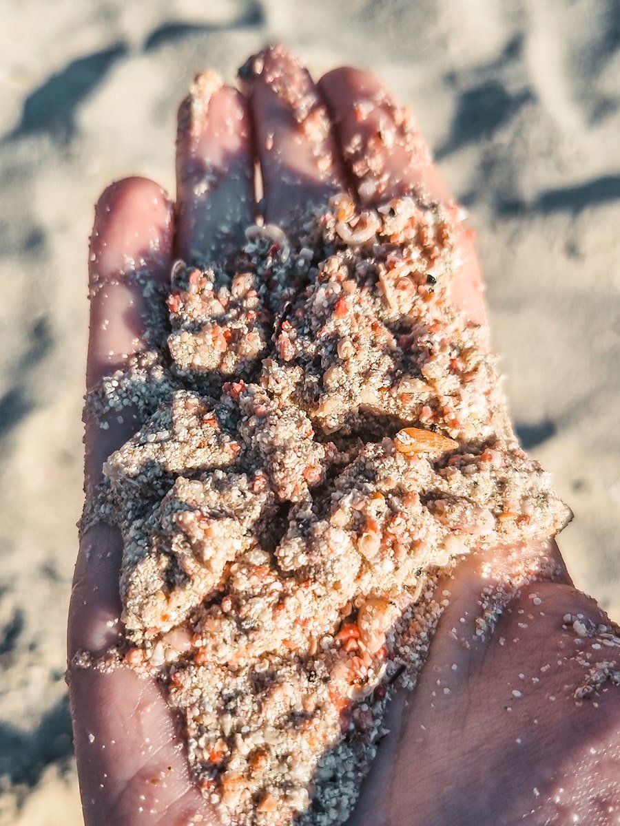 Close up of the pinkish sand