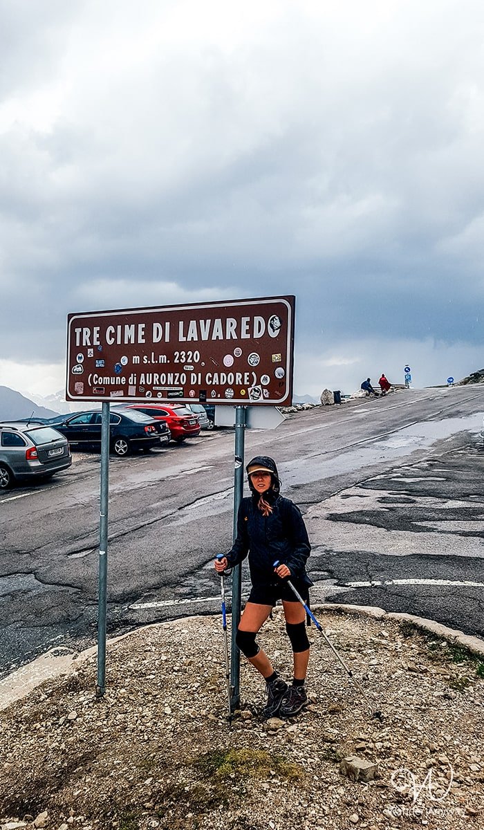 At the parking lot with the Tre Cime di Lavaredo sign