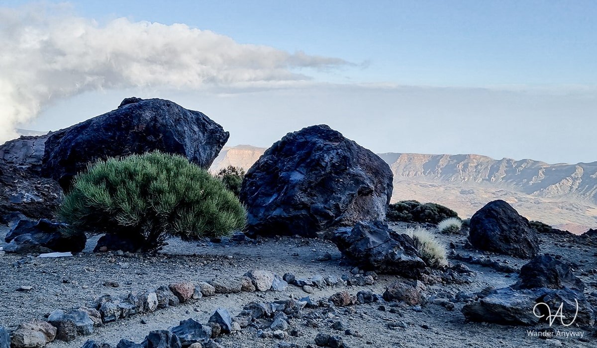 Hiking path leading through volcanic landscapes to Mount Teide