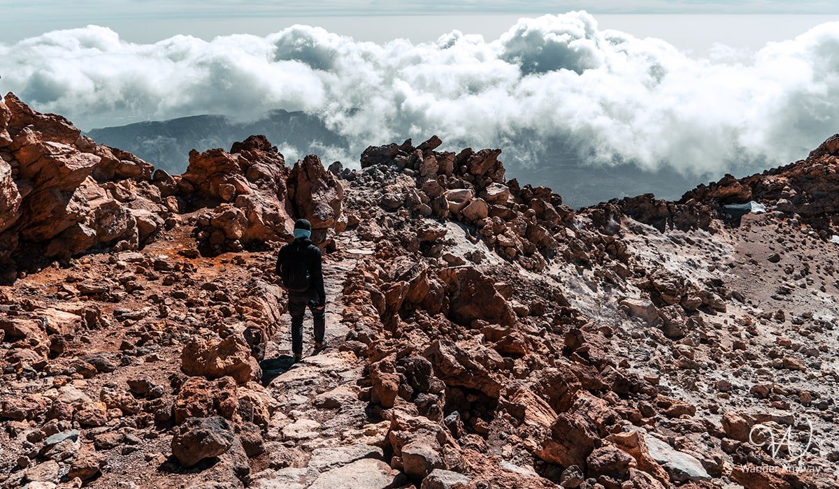 Trekker navigating the rocky paths on Mount Teide