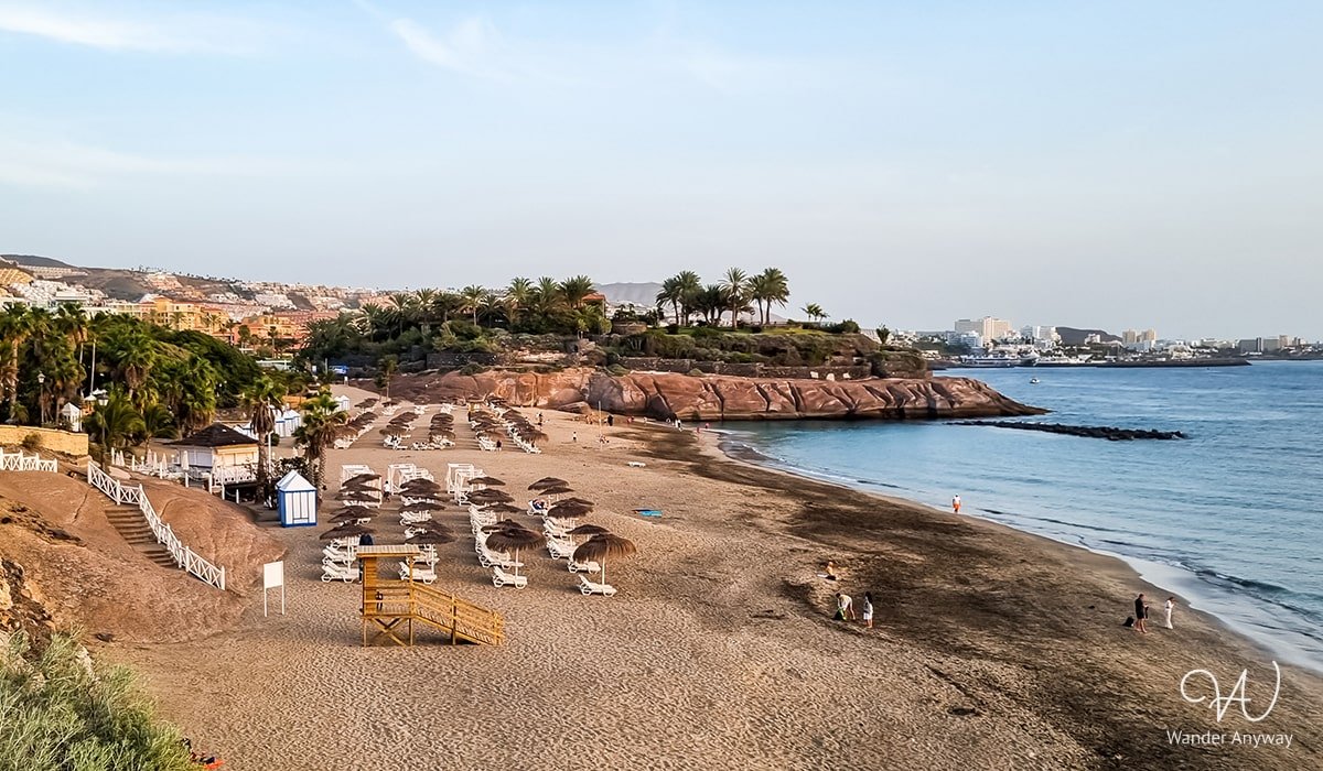 Man-made golden sand beach with upscale surroundings in Costa Adeje, Tenerife.