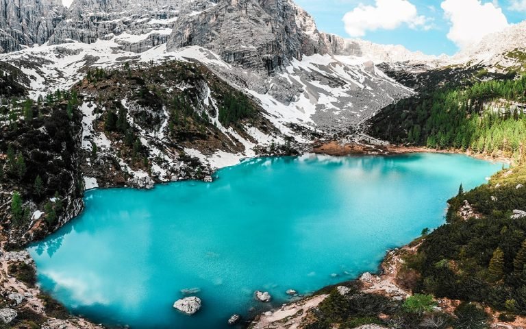 Spectacular view of Lake Sorapis nestled in the Dolomites