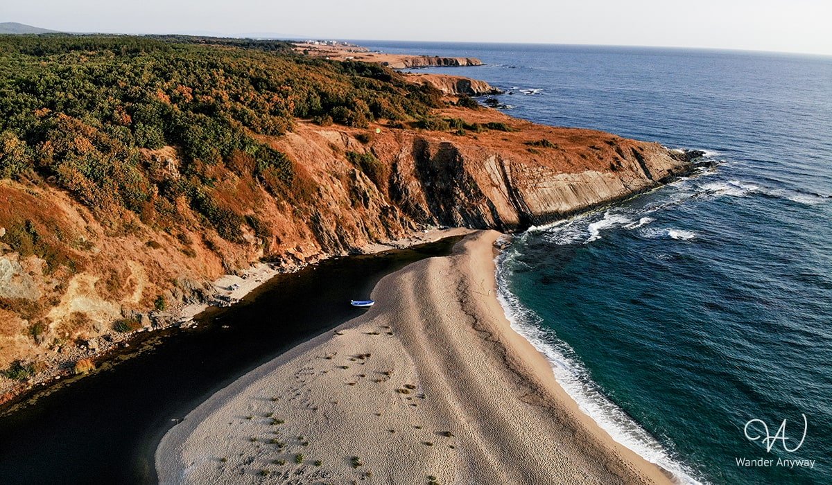 Veleka Beach: Remote paradise with untouched sandy shores and scenic river views.