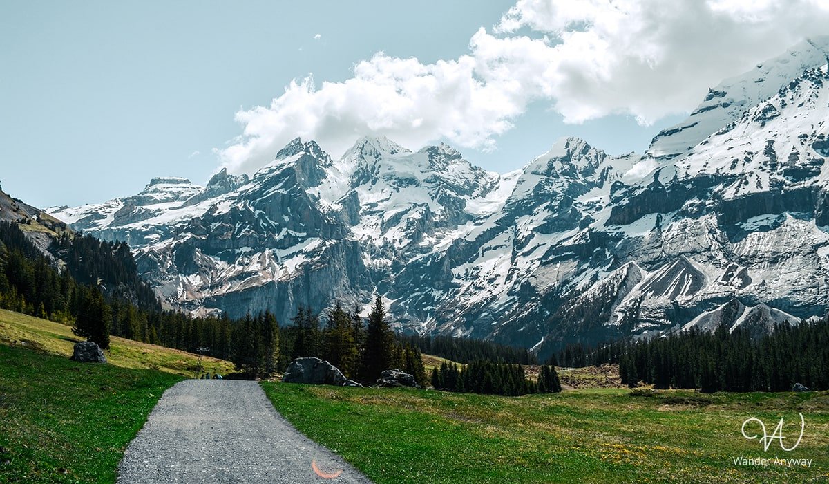 A peaceful moment of solitude along the tranquil hiking trails of Oeschinen Lake