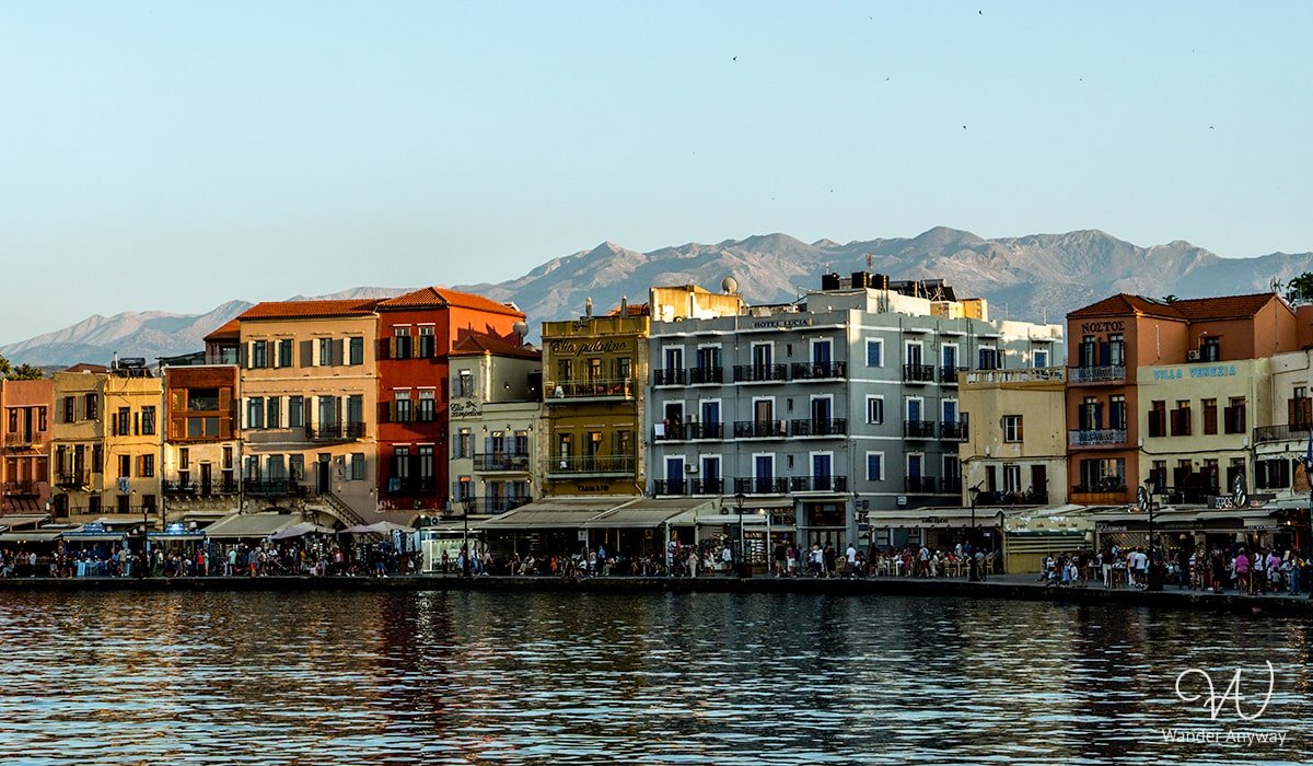A picturesque street in Chania, Crete, lined with colorful buildings and traditional architecture (Top Things to Do in Crete)