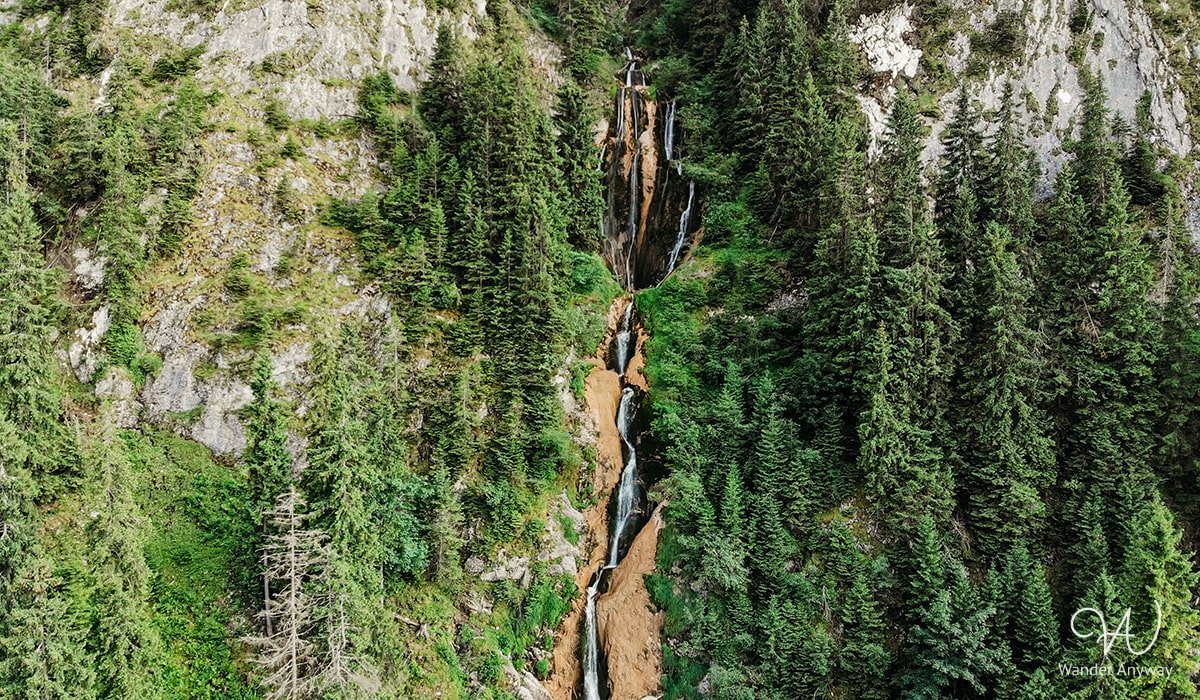 Horses' Waterfall flowing over rugged cliffs in Maramureș