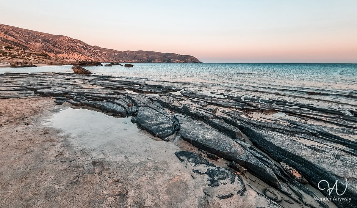 Secluded Kedrodasos Beach offering a natural paradise with white sand and rocky outcrops. (best beaches in Chania)