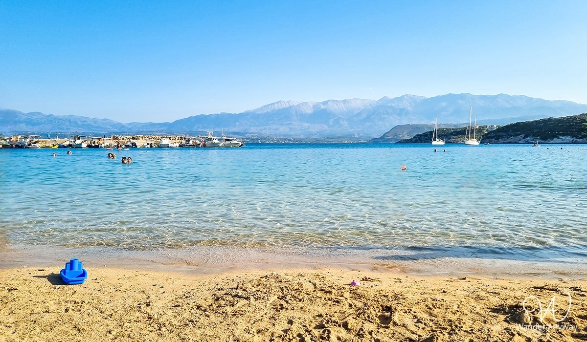 Family-friendly Marathi Beach featuring soft sand and stunning White Mountains views.
