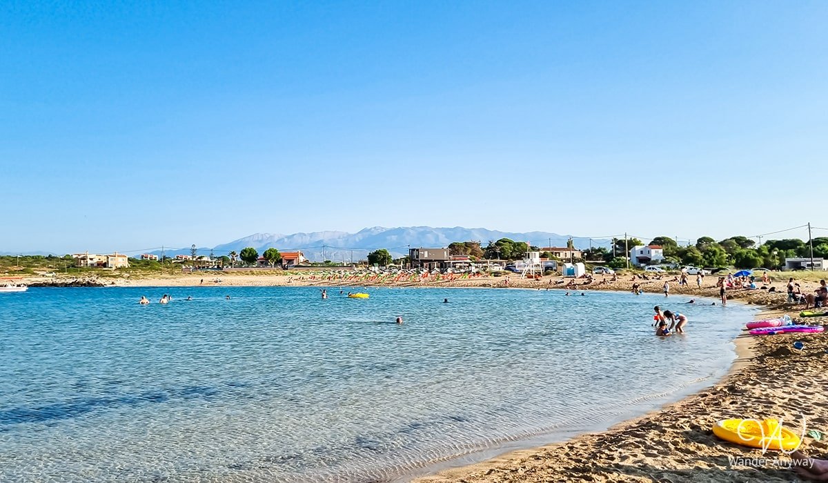 Stavros Beach on the Akrotiri Peninsula, famous for its circular bay and soft golden sand.
