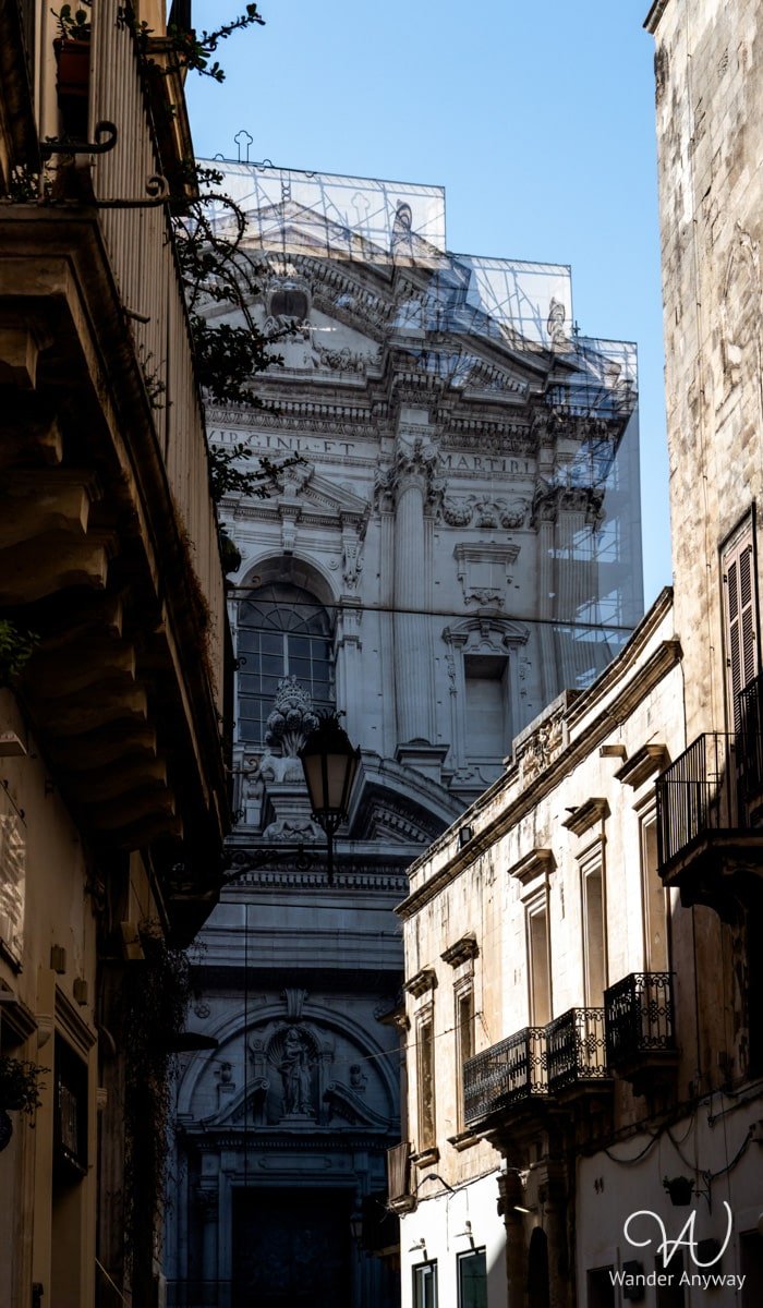 Church of Saint Irene in Lecce, a historic Baroque church known for its grand altar and impressive ceiling frescoes.