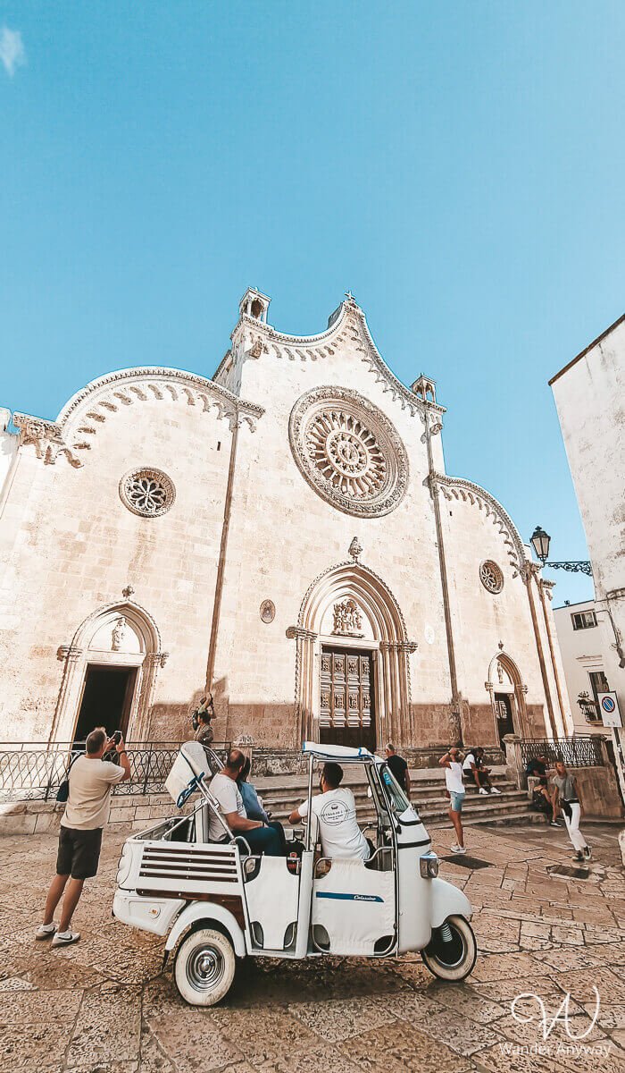 Gothic facade and intricate rose window of the Cathedral of Ostuni