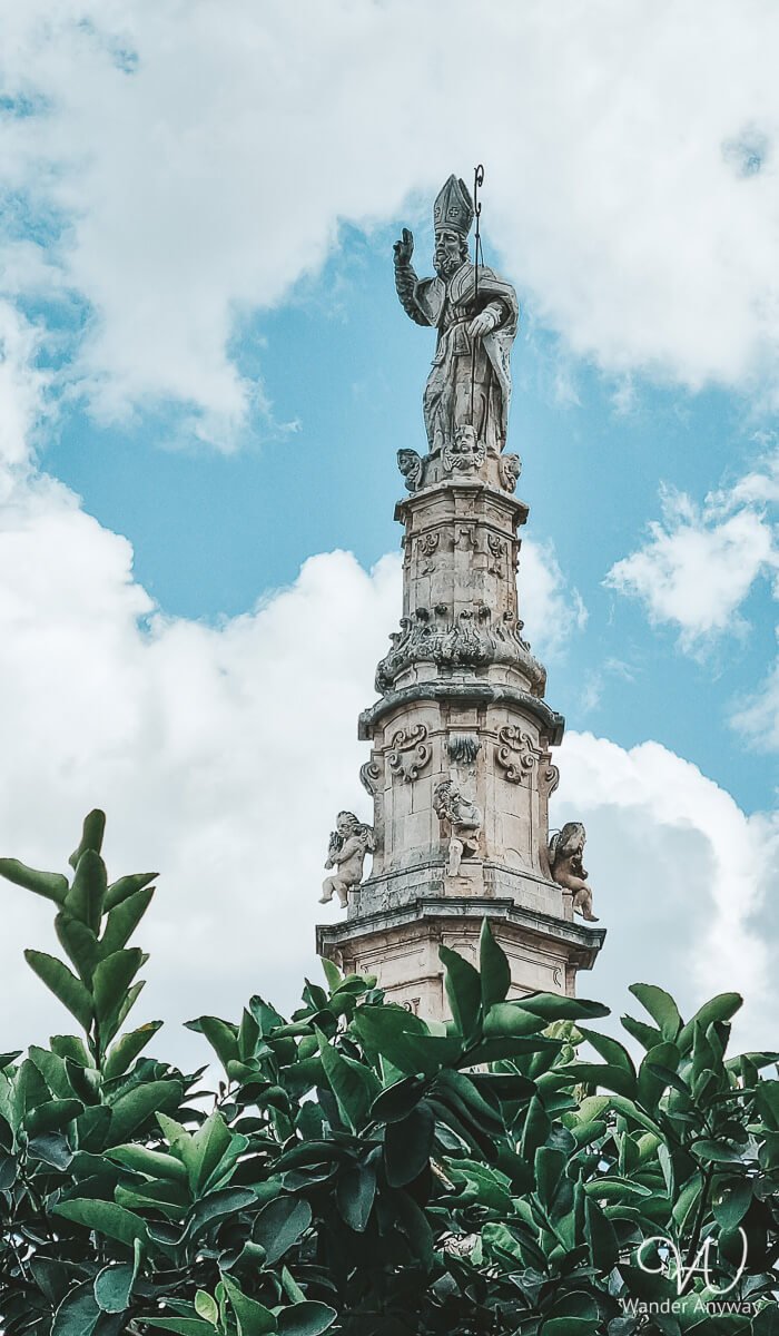 Column of Sant'Oronzo in Piazza della Libertà, a lively square in Ostuni
