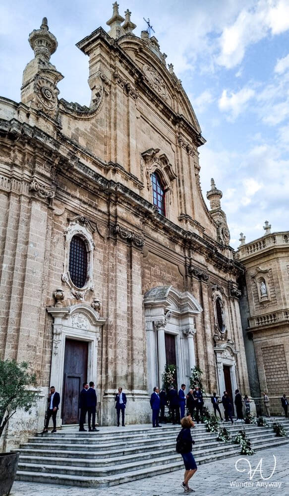 The Cathedral of Madonna della Madia with its baroque architecture and tall bell tower in Monopoli’s center.