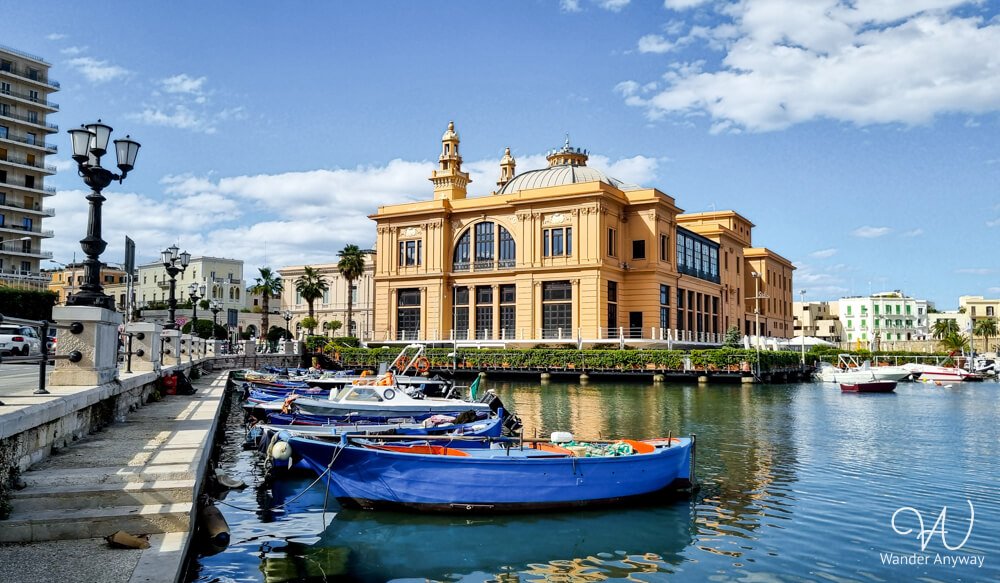 Colorful blue fishing boats docked near Teatro Margherita in Bari — Puglia Itinerary Without a Car: 10 Day Guide to Southern Italy