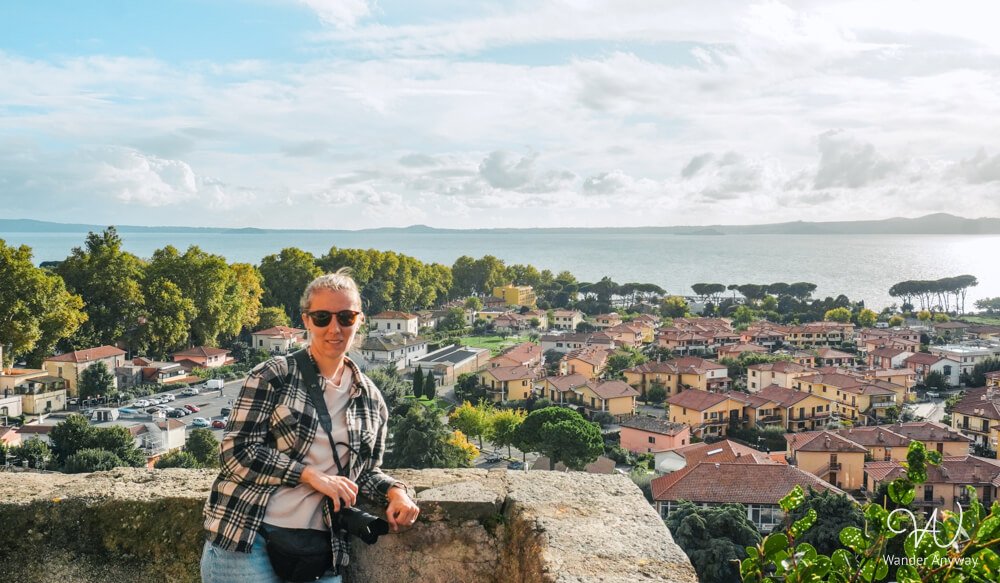 Traveler enjoying the view from Rocca Monaldeschi in Bolsena